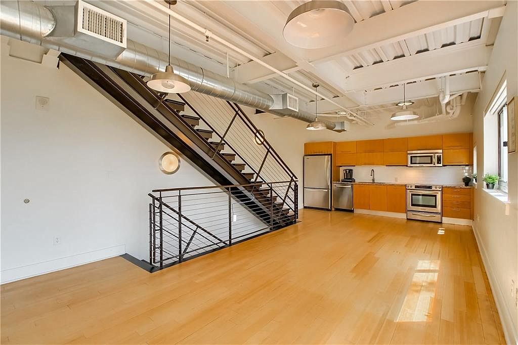 Loft workspace level with industrial ceiling details