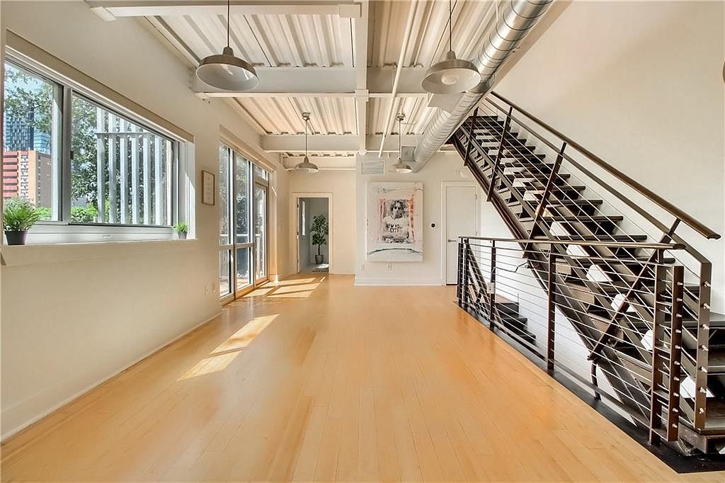 Meeting area adjacent to stair and window line