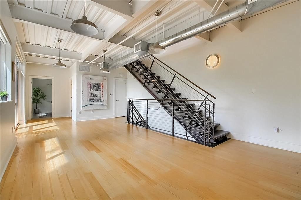 Staircase and open office zone across two levels