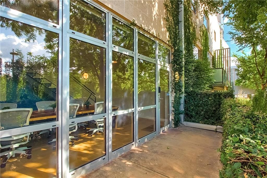 Interior level with full-height window wall