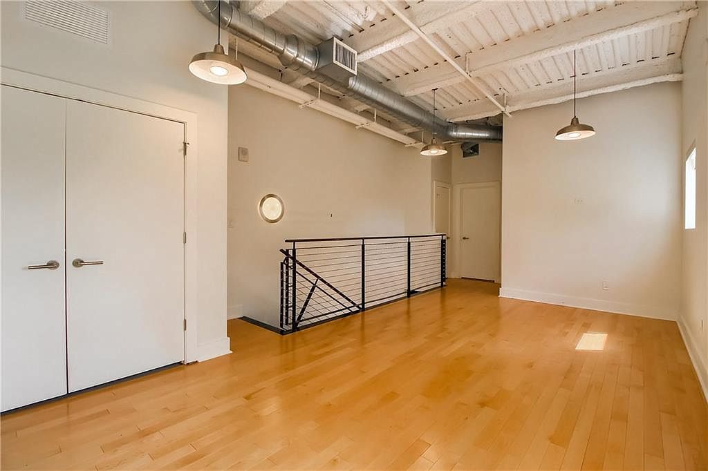 Kitchen area with stainless appliances and prep counter